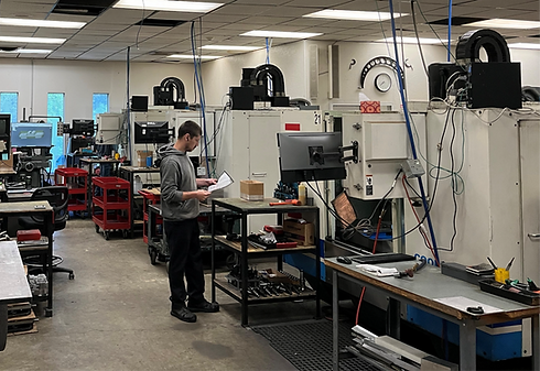 CNC milling machines in a modern machine shop facility
