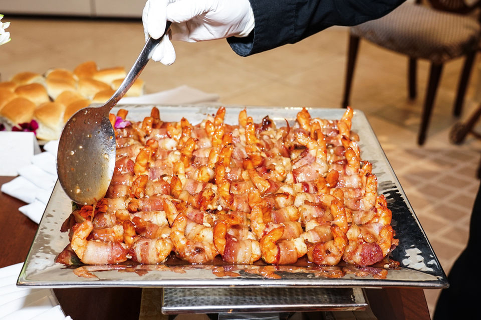 bacon-wrapped shrimp on a platter