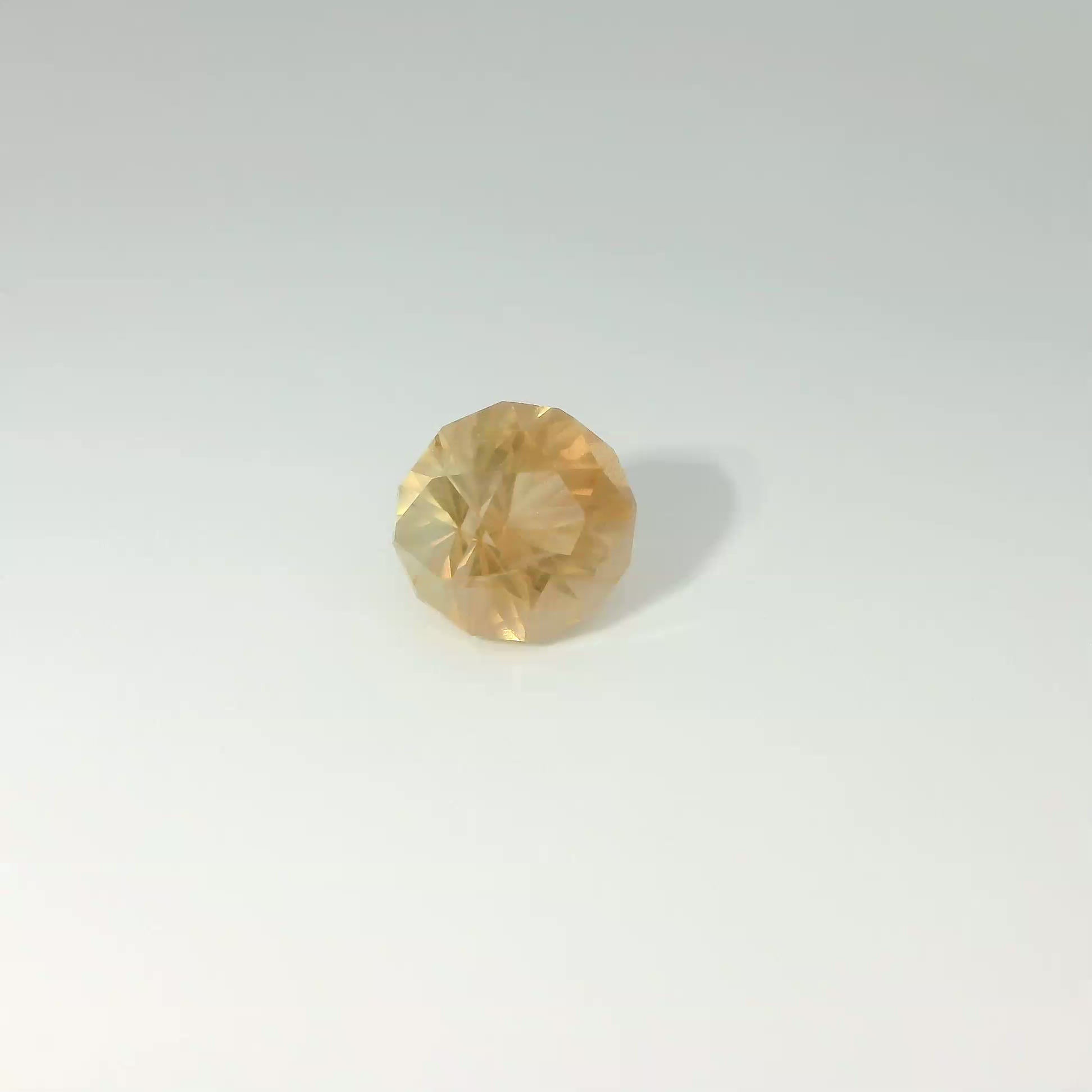 #330- 1.76 ct., 6.5 mm, Peach Schiller Sunstone, Round