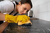 medium-shot-woman-cleaning-home.jpg