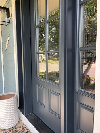 Custom fine finish sprayed front door and side lights.