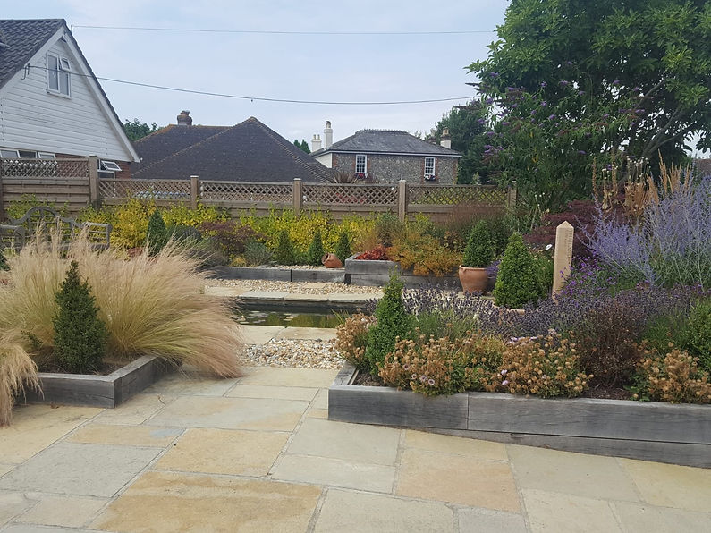 A serene garden with lush ornamental grass