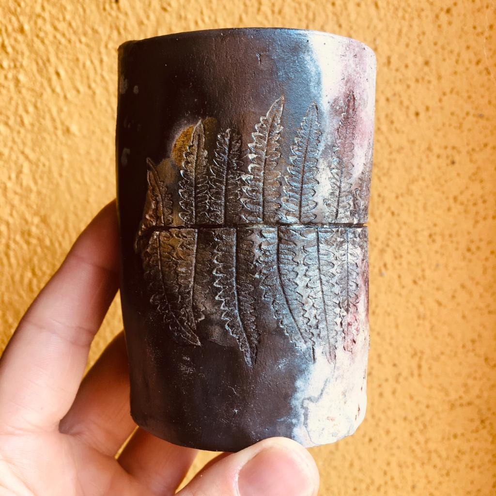 small vessel with fern decoration