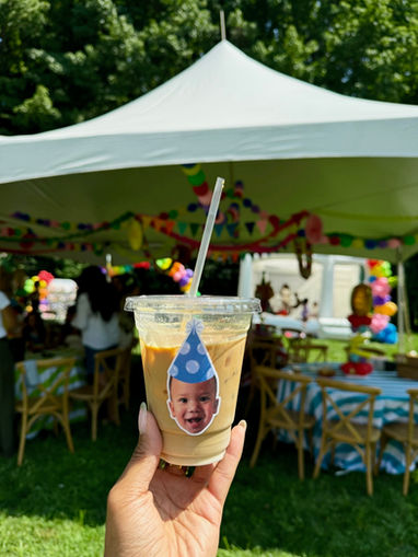 Iced latte with custom logo sticker served at a birthday party in Saddle River, NJ