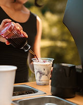 Bluebery basil lattee being poured by barista in west Milford,  NJ