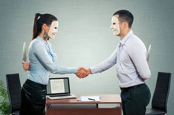 two masked people at office shaking hands but having a knife at their opposite hands that they are hiding from each other