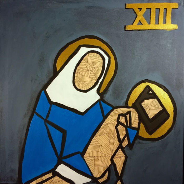 Mary holds the body of Jesus after his death