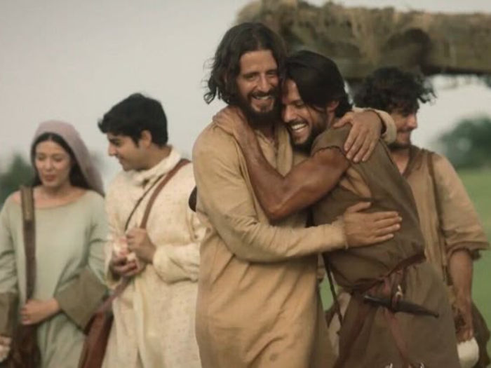 Jesus and his disciples on the way to preach the good news.
