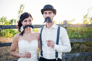 married couple with fake mustache