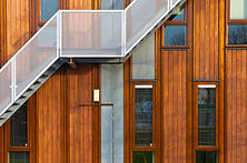 Metal Stairs on Wooden Facade
