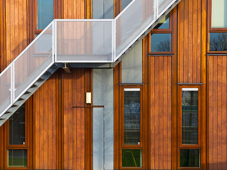 Metal Stairs on Wooden Facade