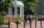 Students walking by the Old Well on UNC-Chapel Hill campus