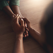 man-consoling-girlfriend-by-holding-her-hands.jpg