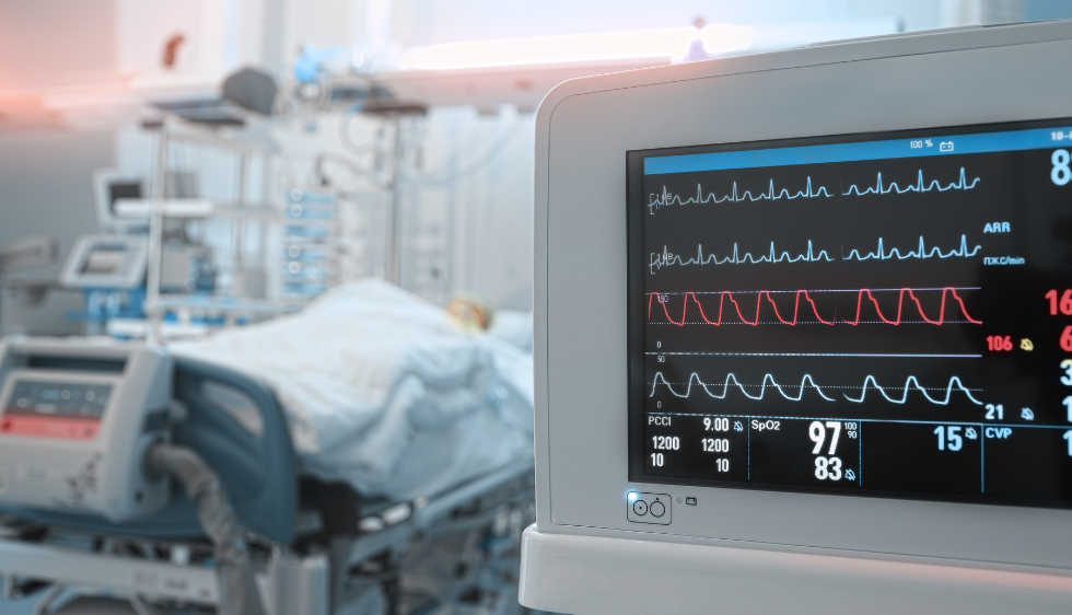 Header Image for Person Injury Lawyer Benjamin Potash. A hospital room featuring an ECG monitor beside a patient bed, illustrating a clinical and caring environment.