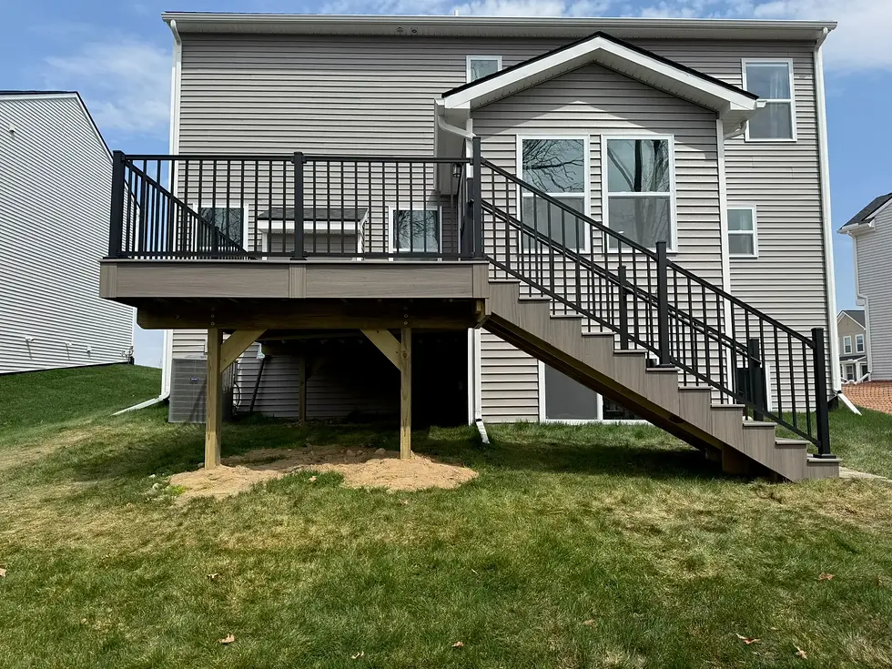 Second Floor New Deck with a long staircase and black deck railing in Oakland County.webp