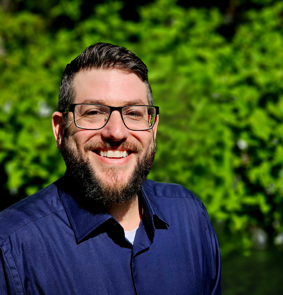 Peter Weiss, New Jersey psychiatric care provider, smiling in an outdoor setting