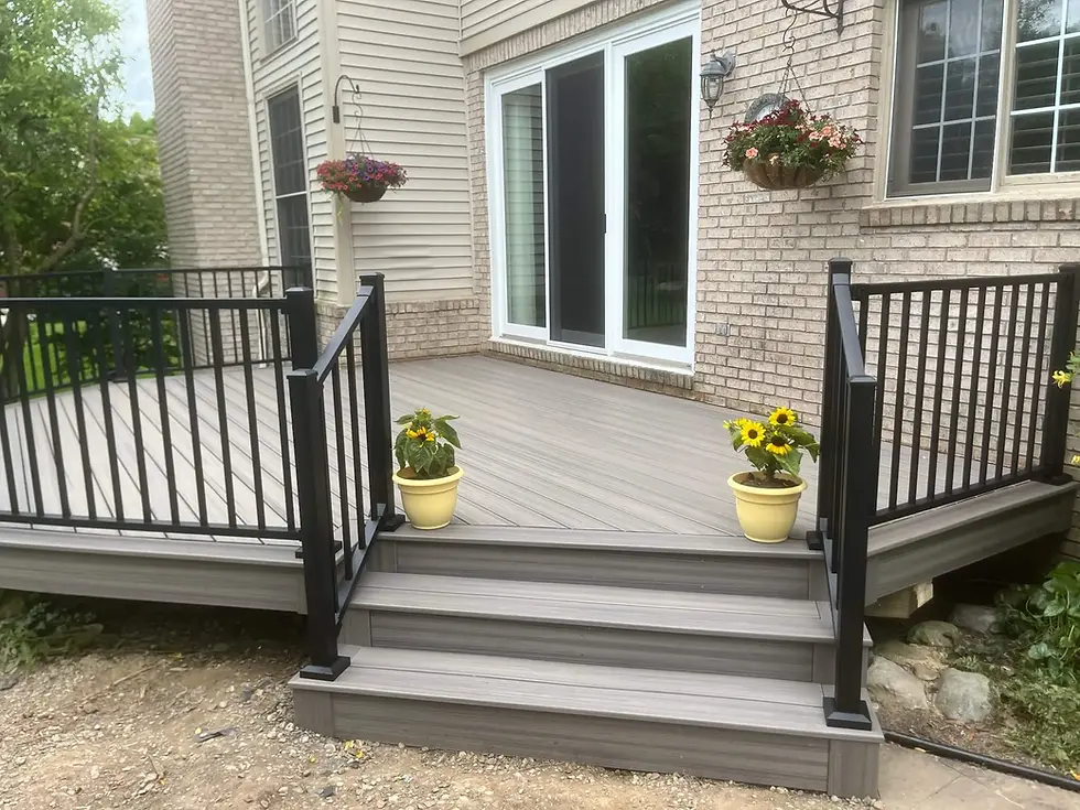 Backyard deck with railing in Oakland County.webp
