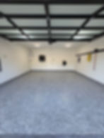 Concrete floor coating in Chilliwack BC garage with smooth, durable protective finish.