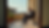 Eye-level view of an elderly gentleman peacefully reading a book on a terrace