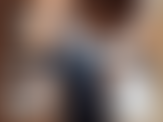 Dentist checking a patient's records during treatment. Book with Clearview Market Dental for Invisalign and other dental services in Red Deer.