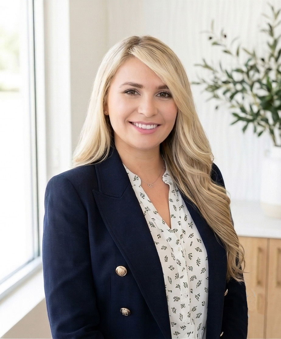 Dr. Eylisa Toro, chiropractor at Pure Renewal Orlando, specializing in neuromusculoskeletal care, shockwave therapy, and cold laser therapy.