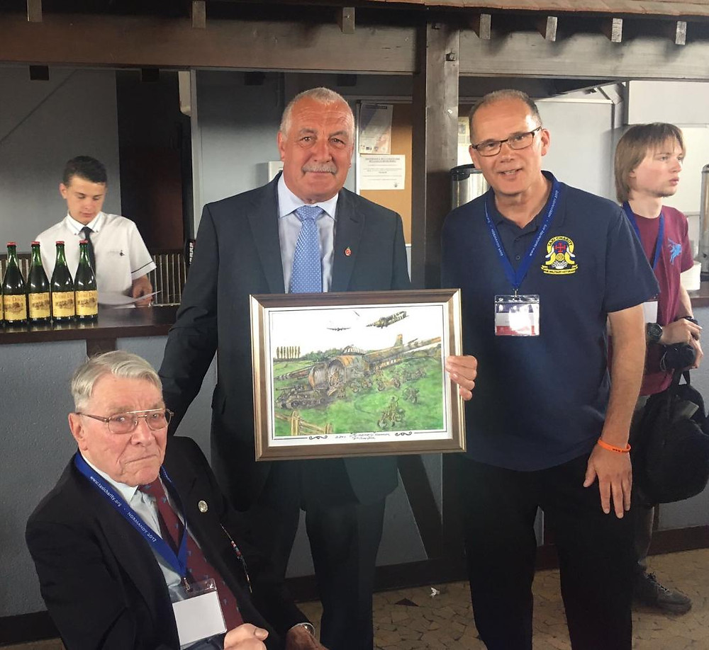 Bill Gladden presents mayor of Ranville with watercolour of My Memory