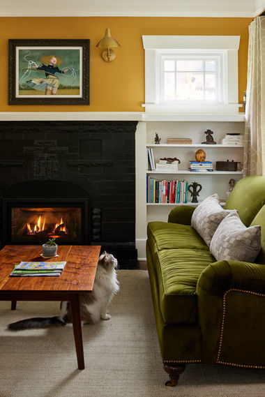 Design-build renovation of kitchen, dining, and living spaces. Golden hues and warm woods paired with bold greens and purples. Rich textures and pops of color add interest to any space.