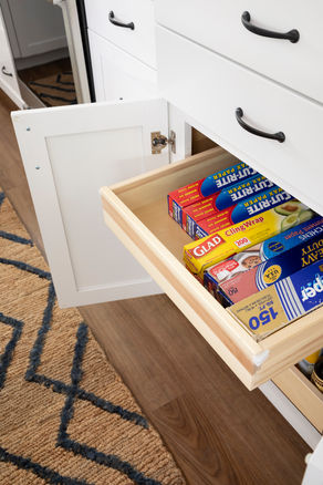 Kitchen renovation to revitalize and maximize space. Customized drawers give the client exactly what they need.