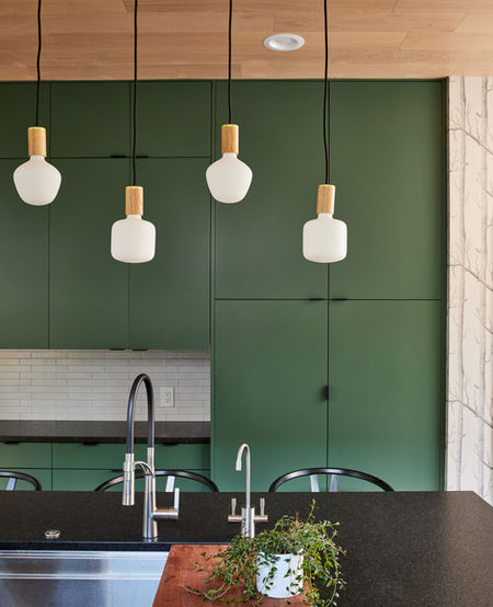 Design-build renovation to bring all the spaces into harmony. Using a palette from deep to light greens throughout - continuity brings calm.