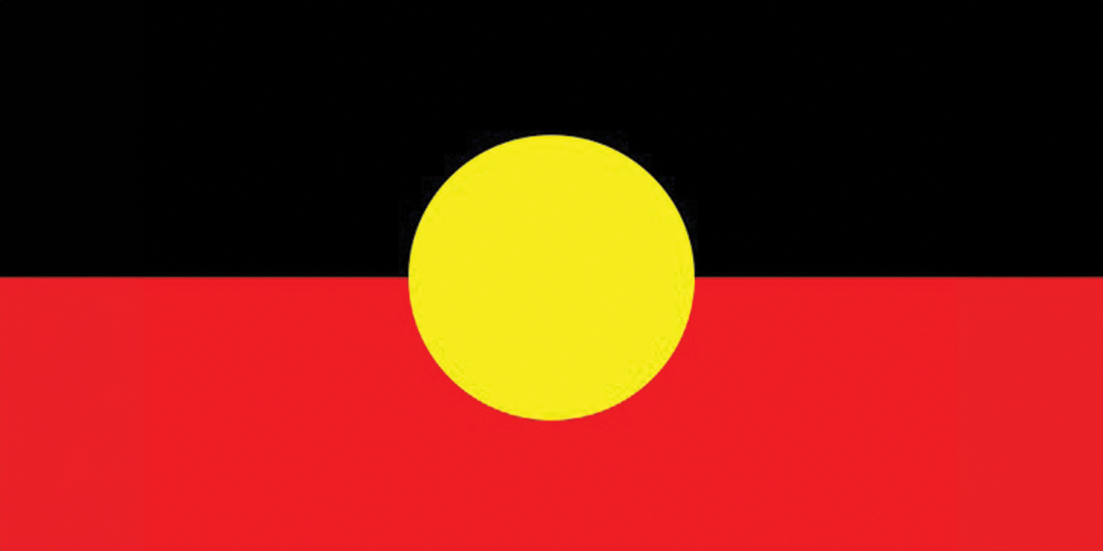 Aboriginal Flag with a black top half, red bottom half, and a yellow circle in the centre