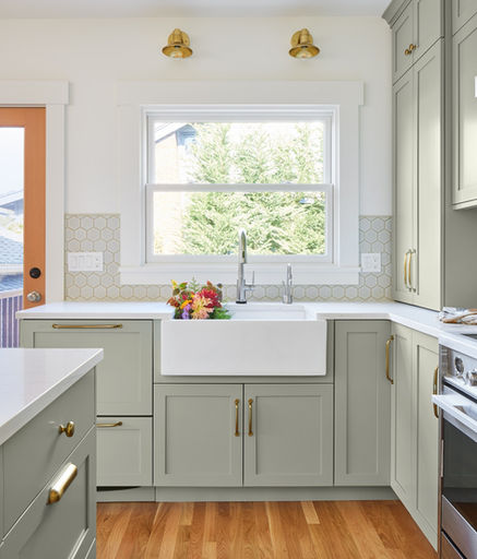 Bright and airy kitchen and bath renovation in Queen Anne. Dramatic bath tile and wallpaper. 