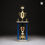 Thumbnail: Gold trophy with blue columns on marble base