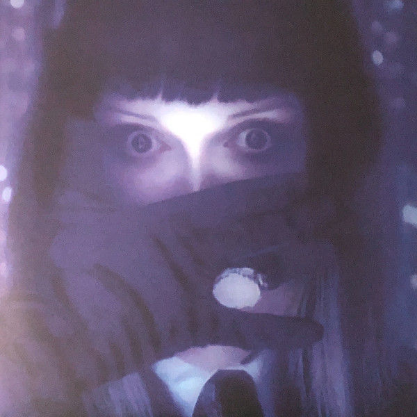 Thumbnail: Close-up portrait, wide eyes, masked face