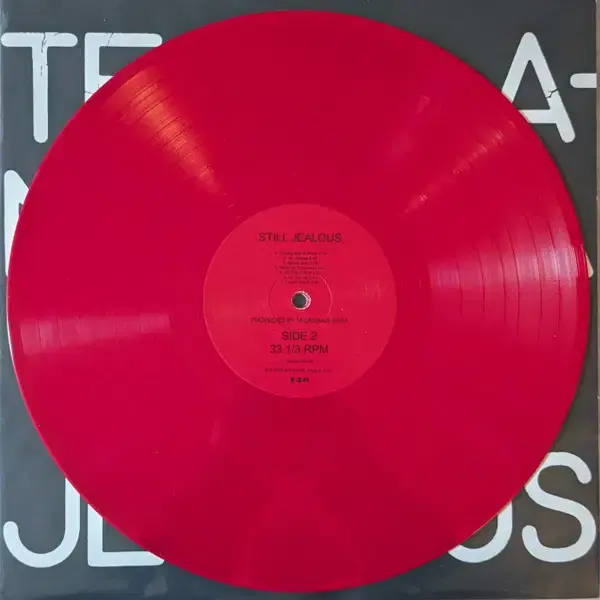 Thumbnail: Red vinyl record of Selena Gomez's Revelación E.P.