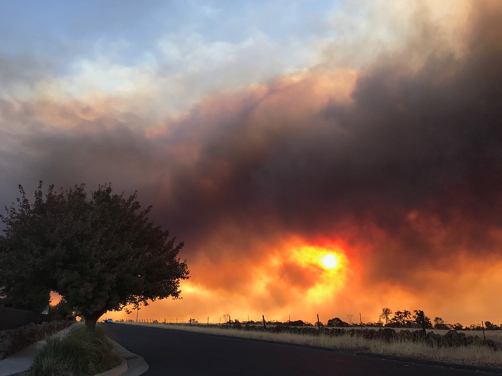 The CAMPFIRE moving across our region 1 year ago. Photo by me from my home.