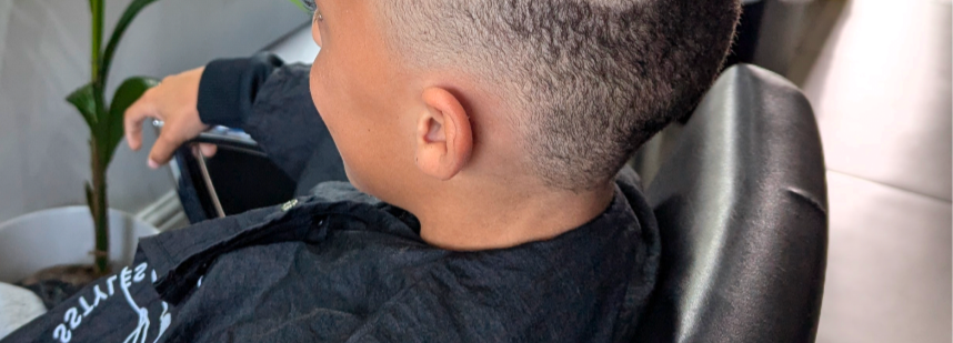 Blonde hair in a graduated bob cut.