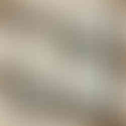 Front view of Monkey Balling mosaic featuring green monkey center tile on a cracked light grey tile pattern.