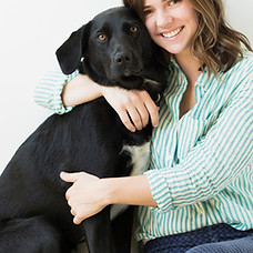 Girl Hugging her Dog