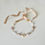 Miniature : Necklace in freshwater pearls with satin ribbon