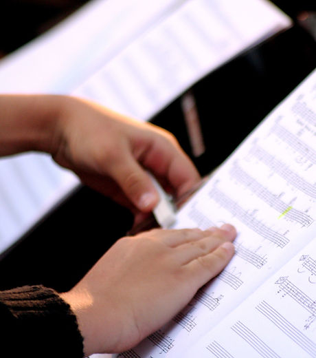 Someone Reading Sheet Music