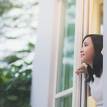 Person Looking Out Window (1).png