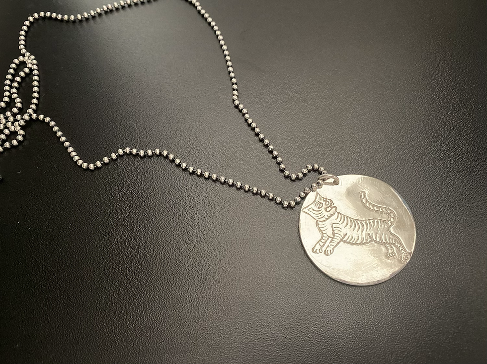 Thumbnail: Hand-engraved silver pendant on chain