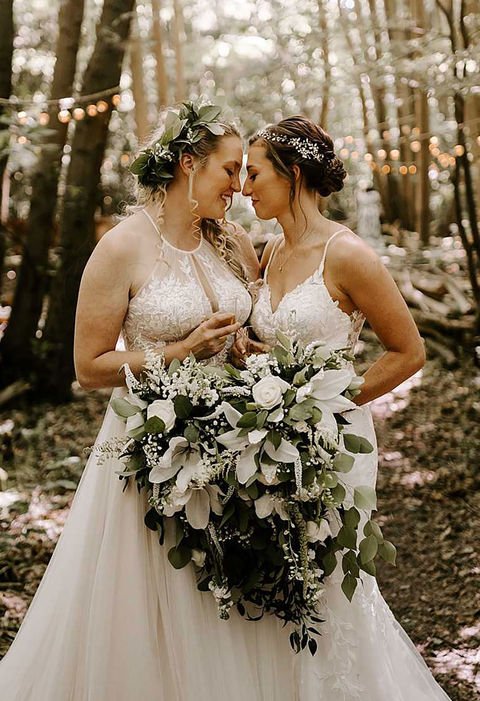 These two gorgeous bouquets were the perfect mirror image of each other, using the couples favourite flower, lilies, as the focal point.