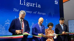 Four delegates cutting a ribbon with the italian flag at CISCE 2026
