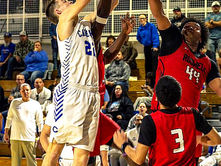 Cavemen Battle Hawks in Playoff Opener