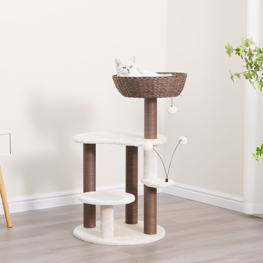 Petpals Quartz PP210341 cat tree with 5 levels, 4 scratching posts, a cat basket, and two cat toys in a room