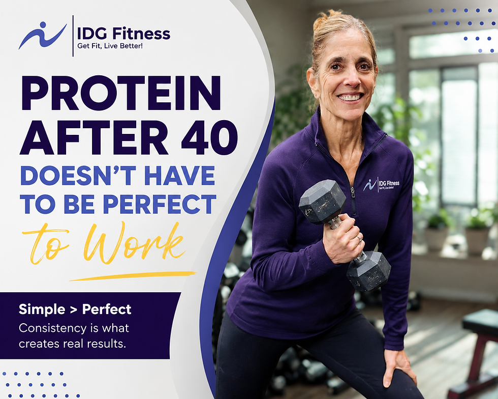 Deb Goodge holding dumbbells in an IDG Fitness pullover, promoting simple protein habits for women over 40 in a bright gym setting.