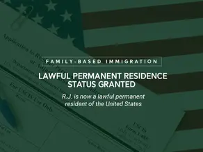 Application to Register Permanent Resident or Adjustment Status paperwork laying on top of an American flag