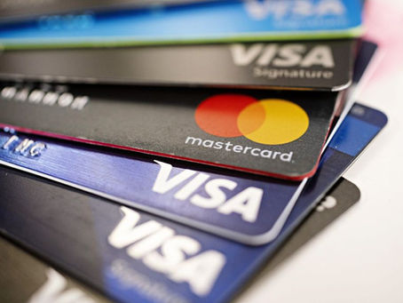 Visa and Mastercard set up to raise credit card fees
