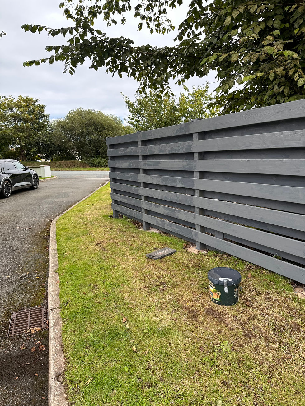 New grey horizontal-slat boundary fence installation – JDM Building Services Isle of Man